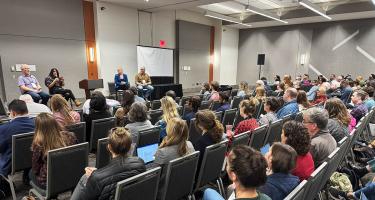 Horizontal photo of Matt Wright, Miriam Fauzia, Danielle Olson, and Matt Shipman speaking at Science Writers 2024. 