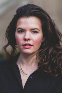 Portrait photo of Ana Gorelova wearing a collared blouse