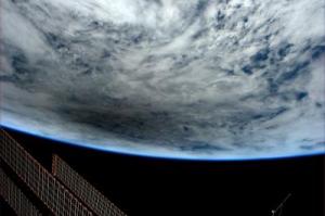 The International Space Station watches the solar eclipse cast its shadow on the Earth. Credit: NASA