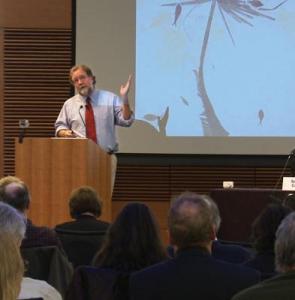 Sean Carroll addresses the 200 attendees at the conference detailing, among other things, the “General Manual of Denialism.”