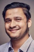 Portrait photo of Saugat Bolakhe with facial hair and smiling